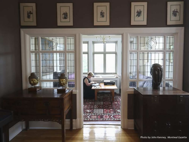 Pilar Shephard-Cumming works in a conservatory attached to the dining room at her apartment (John Kenney / Montreal Gazette)